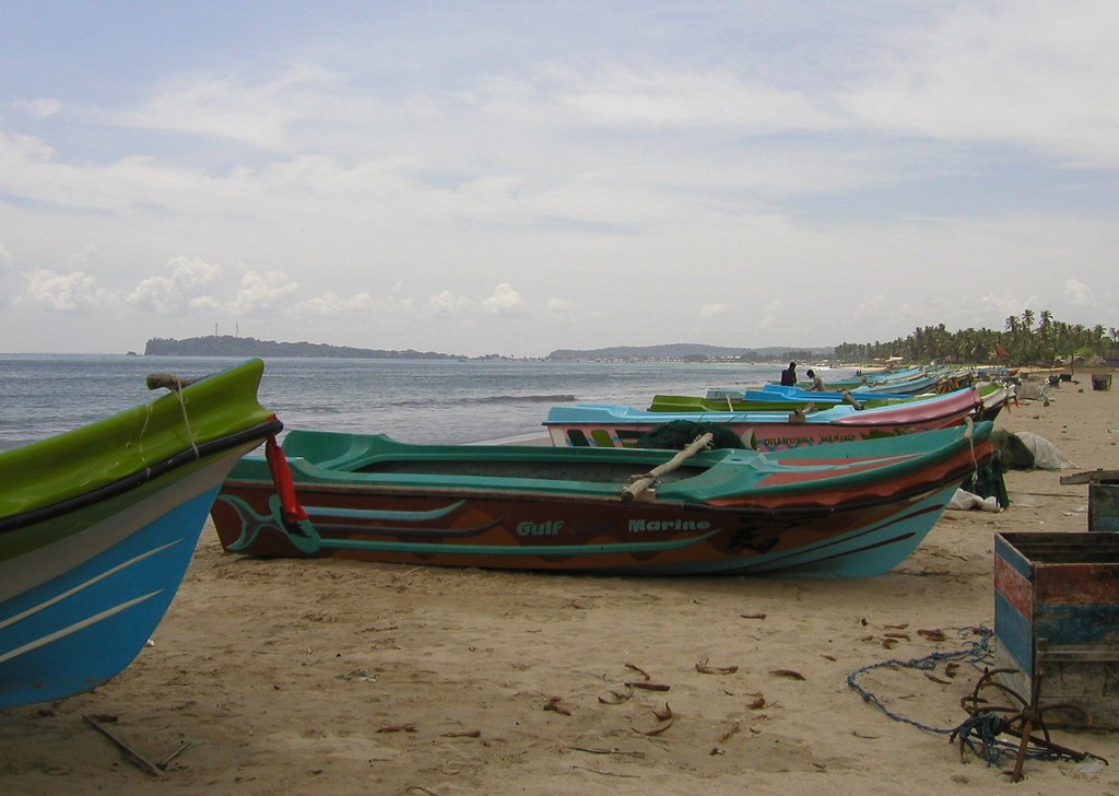 Fishing boats pulled up on an east-coast beach