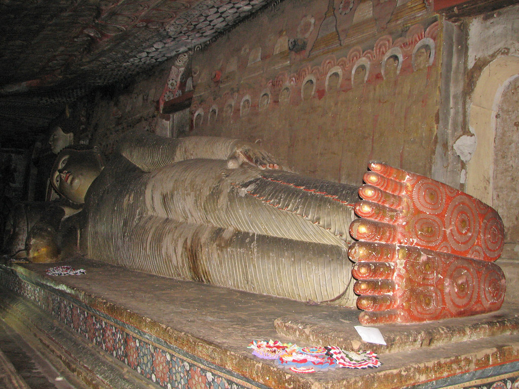 Reclining Buddha inside a Dambulla cave