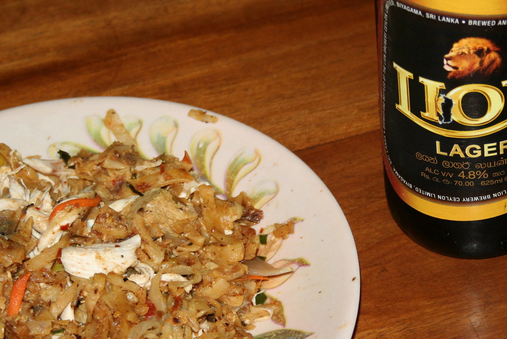 Chicken kottu with a Lion Lager